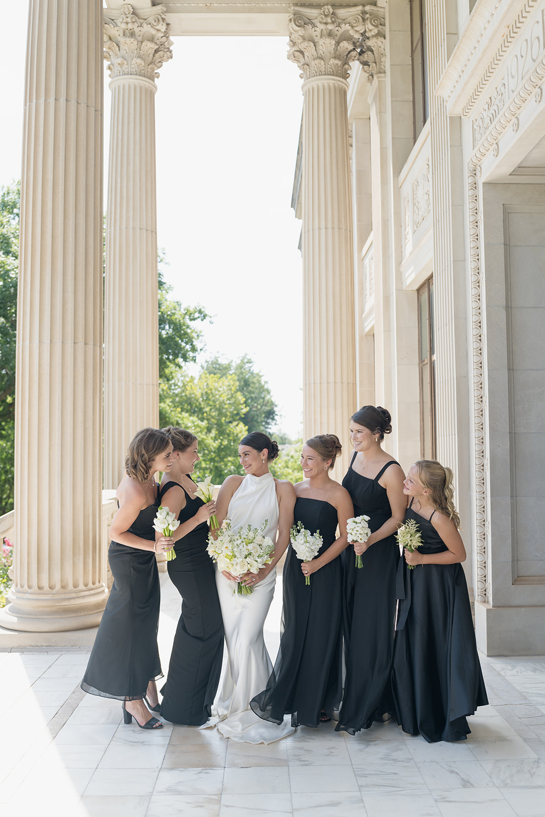 Close editorial portrait showing the bride’s bouquet of white roses and calla lilies, Oklahoma Hall of Fame wedding in Oklahoma City